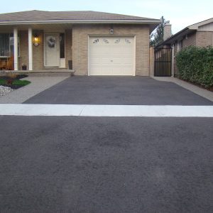 asphalt wtih exposed aggregate border and landscaping